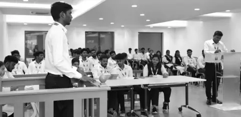 Group of Students Engaged in Moot Court Session at VMLS Law College