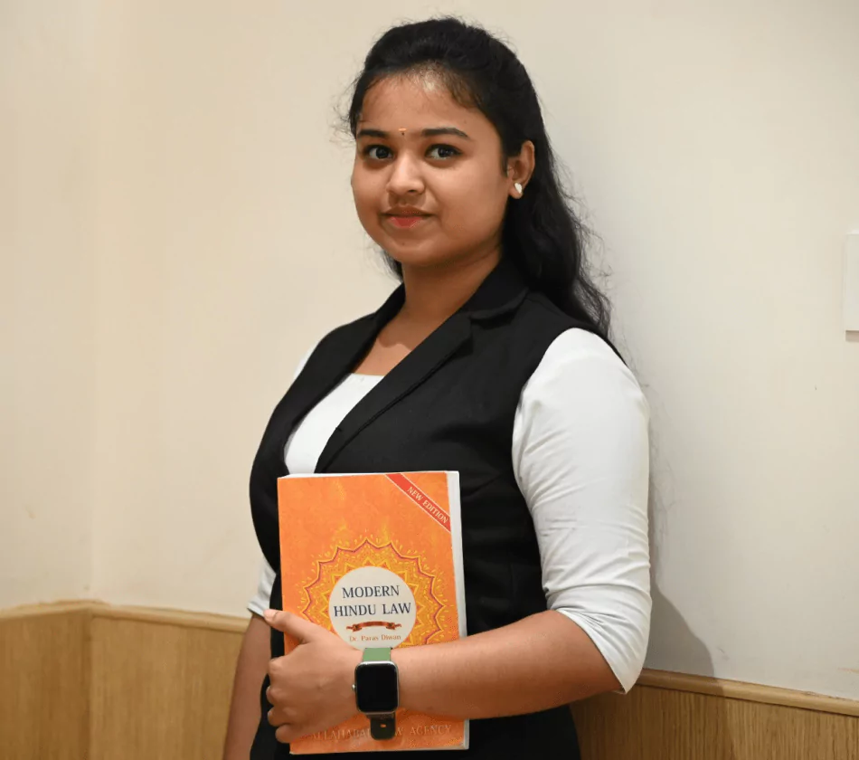 Law Student with Modern Hindu Law Book | VMLS